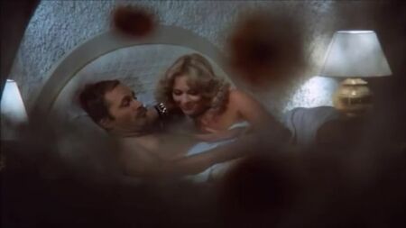 Sybil Danning as Brenda in a scene from The Day of the Cobra (1980)